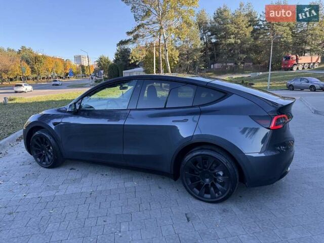 Серый Тесла Model Y, объемом двигателя 0 л и пробегом 38 тыс. км за 24999 $, фото 2 на Automoto.ua