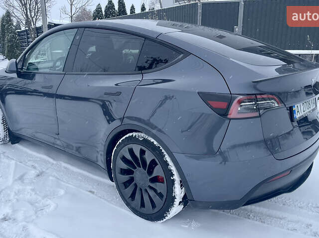 Серый Тесла Model Y, объемом двигателя 0 л и пробегом 54 тыс. км за 26900 $, фото 5 на Automoto.ua