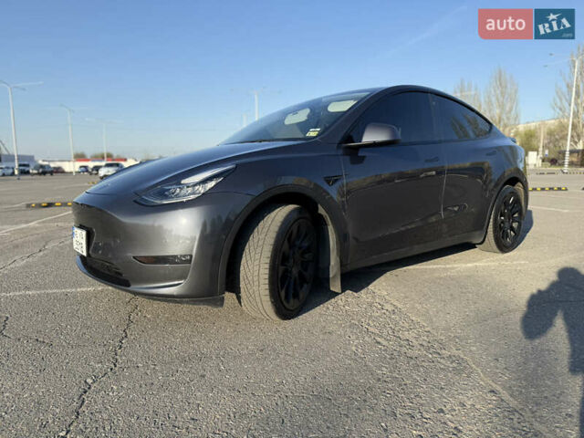 Серый Тесла Model Y, объемом двигателя 0 л и пробегом 99 тыс. км за 24999 $, фото 7 на Automoto.ua