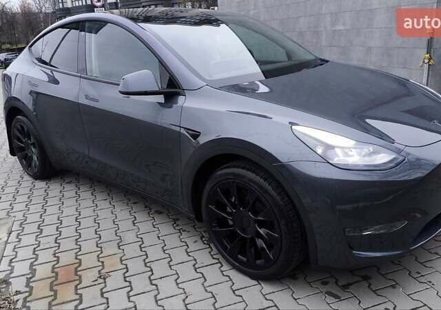 Сірий Тесла Model Y, об'ємом двигуна 0 л та пробігом 48 тис. км за 26400 $, фото 1 на Automoto.ua