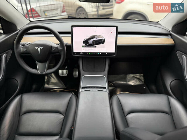 Серый Тесла Model Y, объемом двигателя 0 л и пробегом 53 тыс. км за 28000 $, фото 44 на Automoto.ua