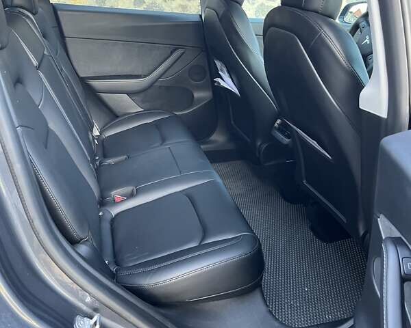 Серый Тесла Model Y, объемом двигателя 0 л и пробегом 23 тыс. км за 29900 $, фото 9 на Automoto.ua