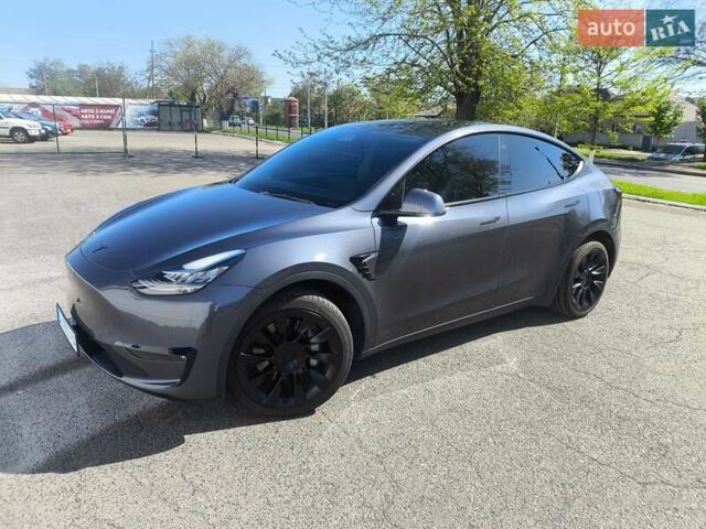 Серый Тесла Model Y, объемом двигателя 0 л и пробегом 77 тыс. км за 30999 $, фото 12 на Automoto.ua