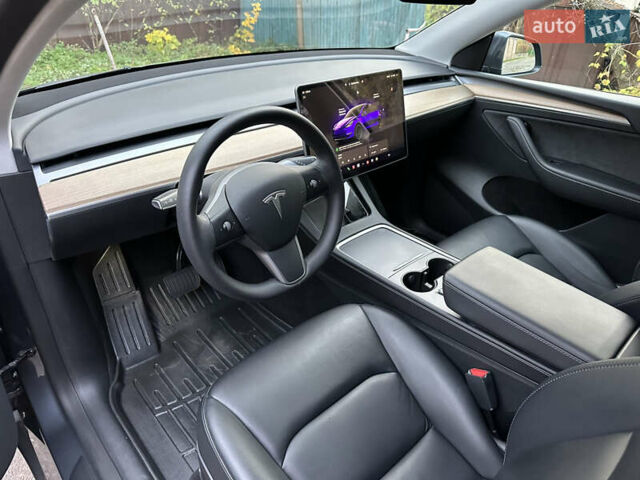 Серый Тесла Model Y, объемом двигателя 0 л и пробегом 95 тыс. км за 24900 $, фото 14 на Automoto.ua