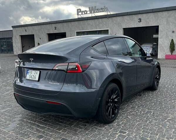 Серый Тесла Model Y, объемом двигателя 0 л и пробегом 65 тыс. км за 21000 $, фото 3 на Automoto.ua