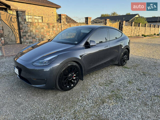 Серый Тесла Model Y, объемом двигателя 0 л и пробегом 112 тыс. км за 27700 $, фото 1 на Automoto.ua