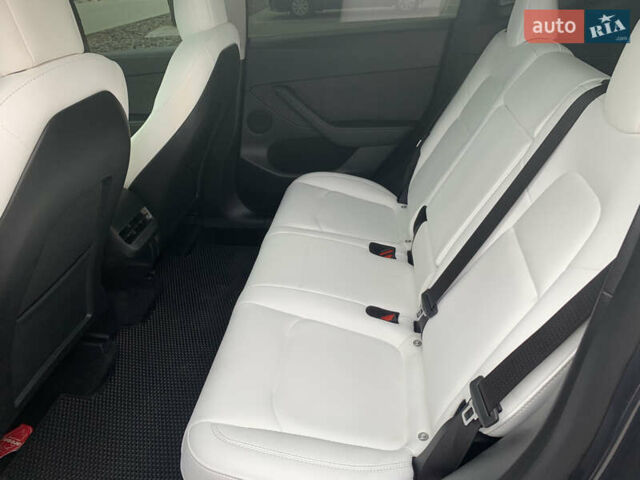 Серый Тесла Model Y, объемом двигателя 0 л и пробегом 29 тыс. км за 32700 $, фото 25 на Automoto.ua