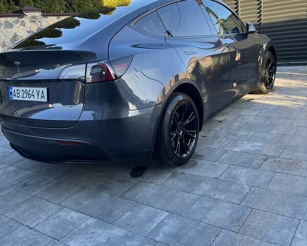 Серый Тесла Model Y, объемом двигателя 0 л и пробегом 23 тыс. км за 29900 $, фото 4 на Automoto.ua