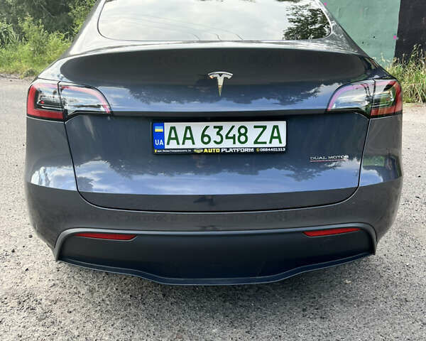 Серый Тесла Model Y, объемом двигателя 0 л и пробегом 21 тыс. км за 29800 $, фото 1 на Automoto.ua