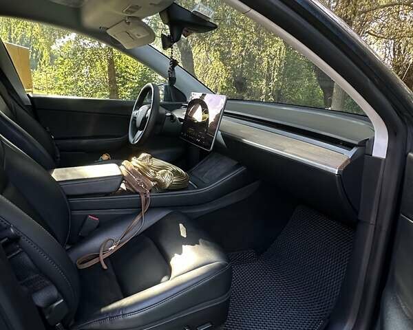 Серый Тесла Model Y, объемом двигателя 0 л и пробегом 60 тыс. км за 28999 $, фото 9 на Automoto.ua