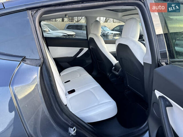 Серый Тесла Model Y, объемом двигателя 0 л и пробегом 65 тыс. км за 19300 $, фото 27 на Automoto.ua