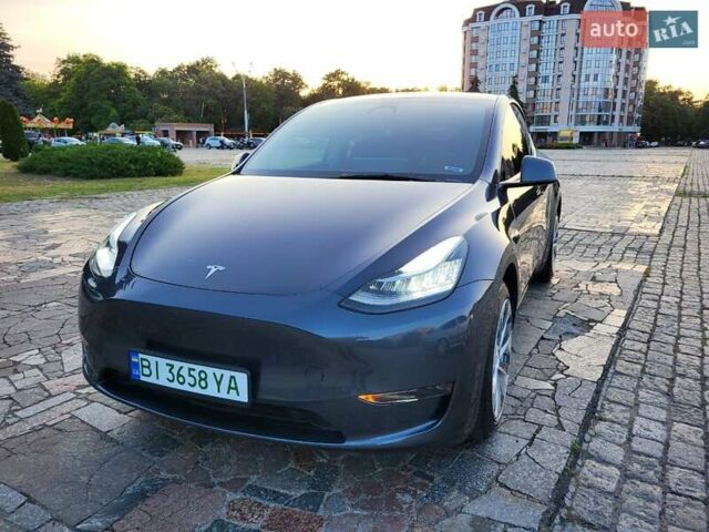 Серый Тесла Model Y, объемом двигателя 0 л и пробегом 49 тыс. км за 26950 $, фото 4 на Automoto.ua
