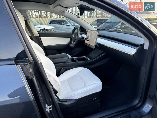Серый Тесла Model Y, объемом двигателя 0 л и пробегом 65 тыс. км за 19300 $, фото 28 на Automoto.ua