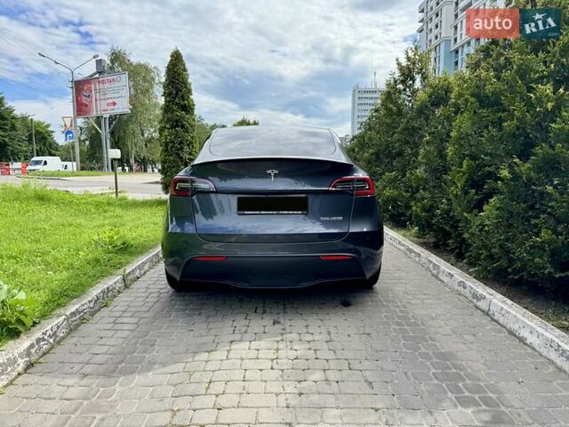 Серый Тесла Model Y, объемом двигателя 0 л и пробегом 28 тыс. км за 40865 $, фото 2 на Automoto.ua
