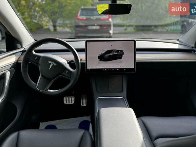 Серый Тесла Model Y, объемом двигателя 0 л и пробегом 54 тыс. км за 31500 $, фото 13 на Automoto.ua