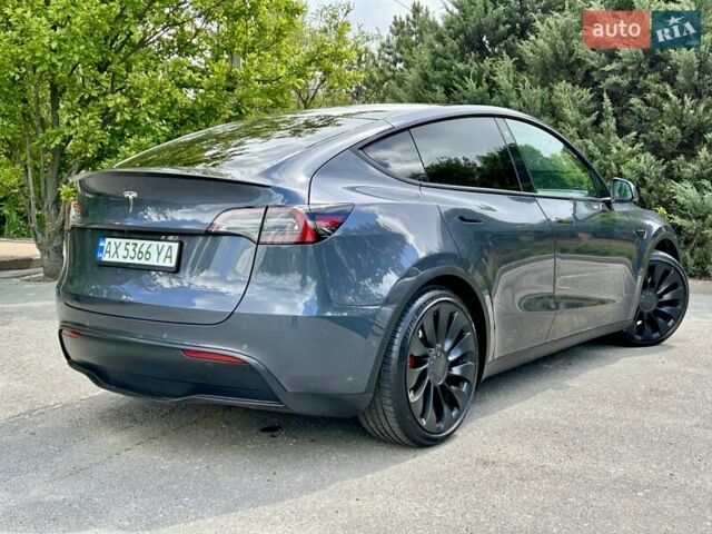 Серый Тесла Model Y, объемом двигателя 0 л и пробегом 56 тыс. км за 28500 $, фото 1 на Automoto.ua