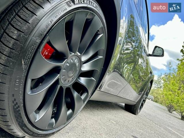 Серый Тесла Model Y, объемом двигателя 0 л и пробегом 56 тыс. км за 28500 $, фото 14 на Automoto.ua