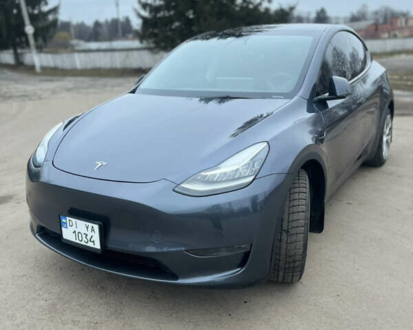 Серый Тесла Model Y, объемом двигателя 0 л и пробегом 48 тыс. км за 29000 $, фото 1 на Automoto.ua