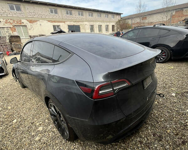 Серый Тесла Model Y, объемом двигателя 0 л и пробегом 99 тыс. км за 19600 $, фото 1 на Automoto.ua