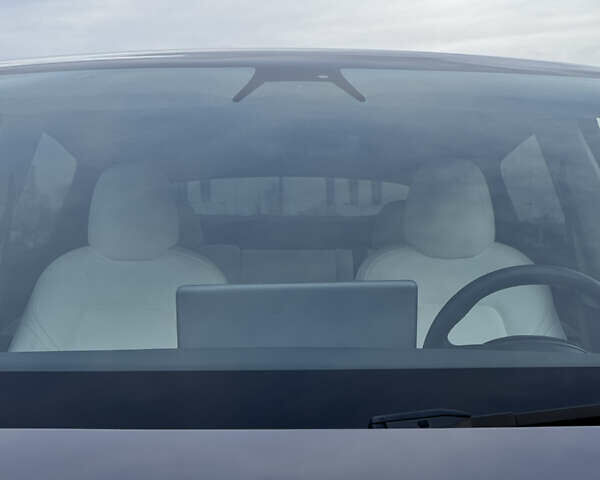 Серый Тесла Model Y, объемом двигателя 0 л и пробегом 26 тыс. км за 28900 $, фото 25 на Automoto.ua