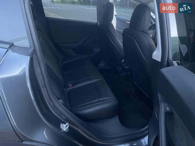 Сірий Тесла Model Y, об'ємом двигуна 0 л та пробігом 69 тис. км за 29999 $, фото 16 на Automoto.ua