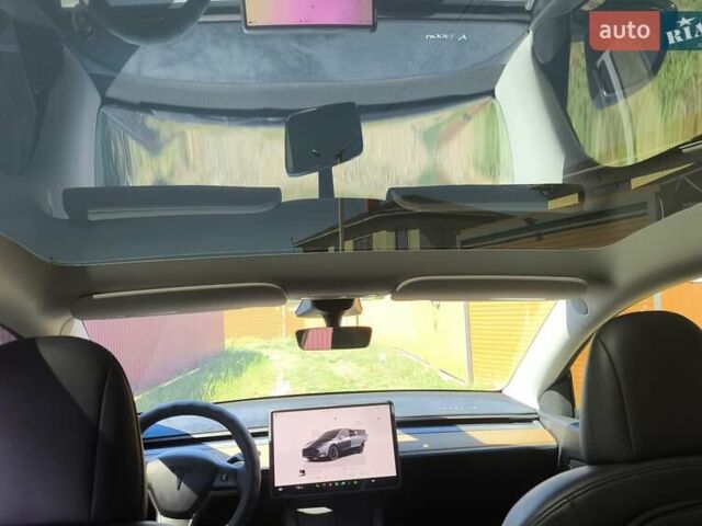 Серый Тесла Model Y, объемом двигателя 0 л и пробегом 77 тыс. км за 30999 $, фото 46 на Automoto.ua