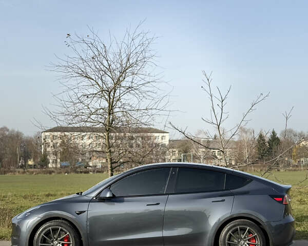 Серый Тесла Model Y, объемом двигателя 0 л и пробегом 84 тыс. км за 22999 $, фото 1 на Automoto.ua