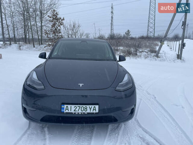 Серый Тесла Model Y, объемом двигателя 0 л и пробегом 54 тыс. км за 26900 $, фото 2 на Automoto.ua