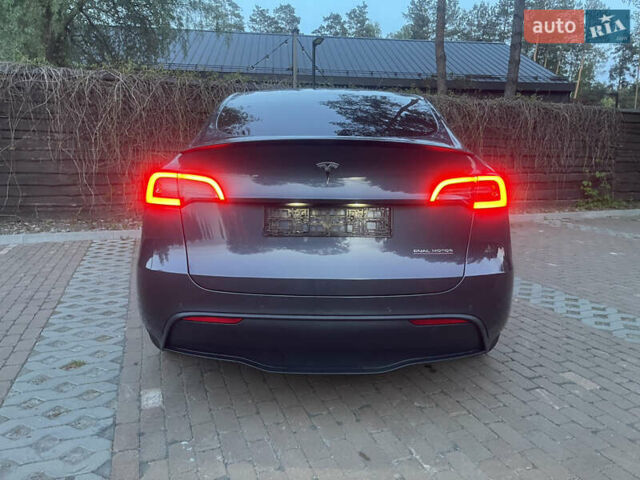 Сірий Тесла Model Y, об'ємом двигуна 0 л та пробігом 69 тис. км за 29999 $, фото 29 на Automoto.ua