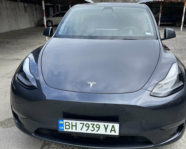 Серый Тесла Model Y, объемом двигателя 0 л и пробегом 65 тыс. км за 26400 $, фото 2 на Automoto.ua