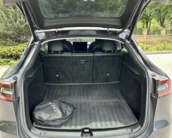 Серый Тесла Model Y, объемом двигателя 0 л и пробегом 56 тыс. км за 28500 $, фото 28 на Automoto.ua