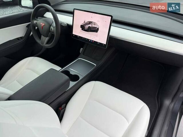 Серый Тесла Model Y, объемом двигателя 0 л и пробегом 85 тыс. км за 23900 $, фото 61 на Automoto.ua