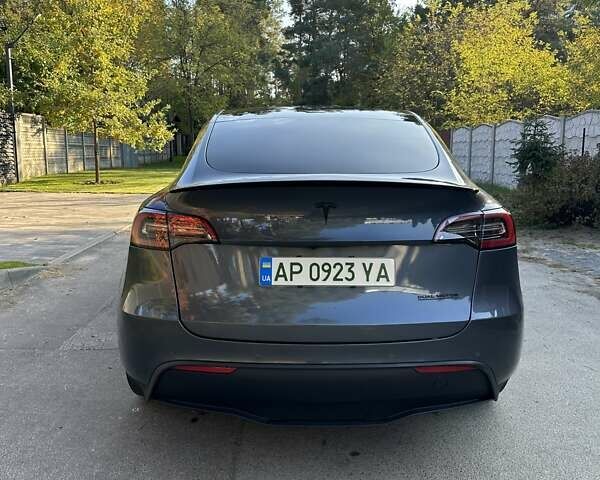 Серый Тесла Model Y, объемом двигателя 0 л и пробегом 28 тыс. км за 32999 $, фото 6 на Automoto.ua