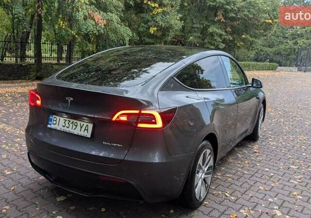 Серый Тесла Model Y, объемом двигателя 0 л и пробегом 115 тыс. км за 26500 $, фото 7 на Automoto.ua