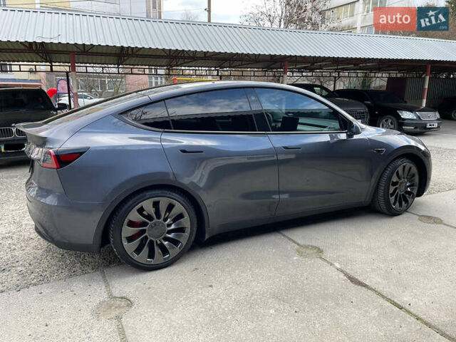 Серый Тесла Model Y, объемом двигателя 0 л и пробегом 65 тыс. км за 27400 $, фото 1 на Automoto.ua