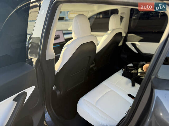 Серый Тесла Model Y, объемом двигателя 0 л и пробегом 99 тыс. км за 24999 $, фото 14 на Automoto.ua