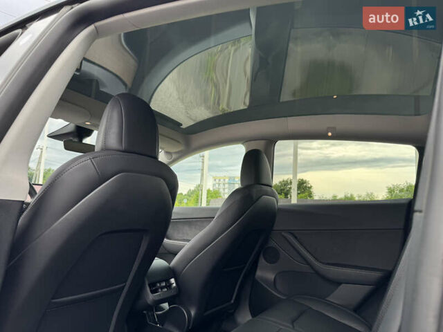 Серый Тесла Model Y, объемом двигателя 0 л и пробегом 27 тыс. км за 27500 $, фото 36 на Automoto.ua