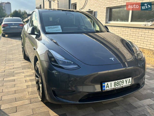 Серый Тесла Model Y, объемом двигателя 0 л и пробегом 65 тыс. км за 29500 $, фото 1 на Automoto.ua