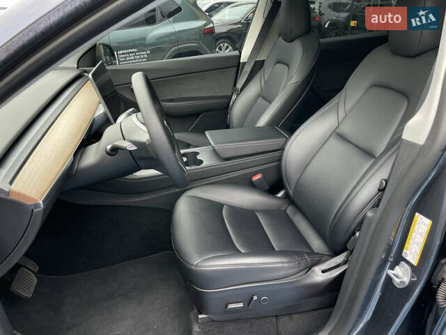 Серый Тесла Model Y, объемом двигателя 0 л и пробегом 44 тыс. км за 29900 $, фото 18 на Automoto.ua