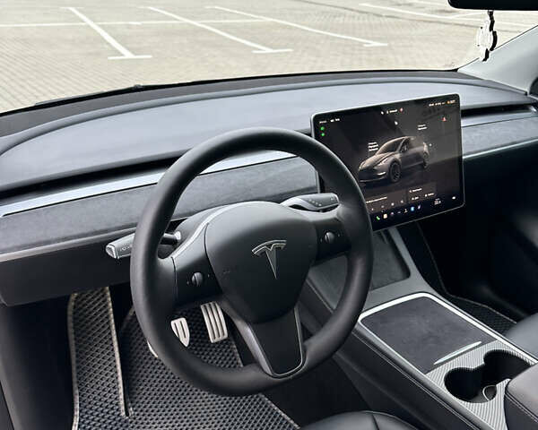 Серый Тесла Model Y, объемом двигателя 0 л и пробегом 58 тыс. км за 28500 $, фото 33 на Automoto.ua