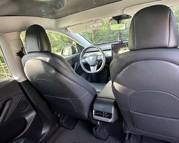 Серый Тесла Model Y, объемом двигателя 0 л и пробегом 60 тыс. км за 28999 $, фото 11 на Automoto.ua