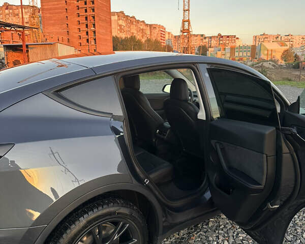 Серый Тесла Model Y, объемом двигателя 0 л и пробегом 77 тыс. км за 26000 $, фото 14 на Automoto.ua