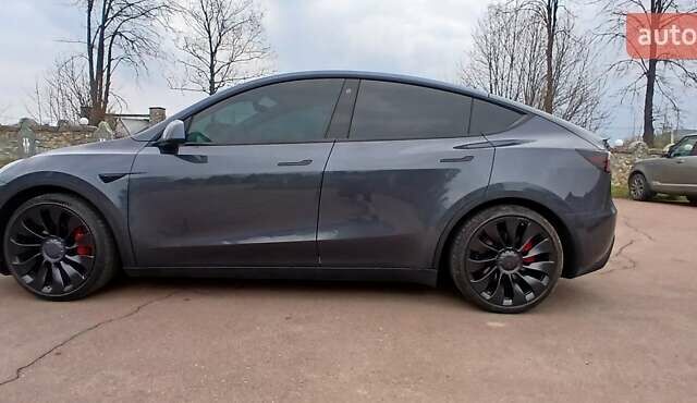 Серый Тесла Model Y, объемом двигателя 0 л и пробегом 65 тыс. км за 25700 $, фото 8 на Automoto.ua