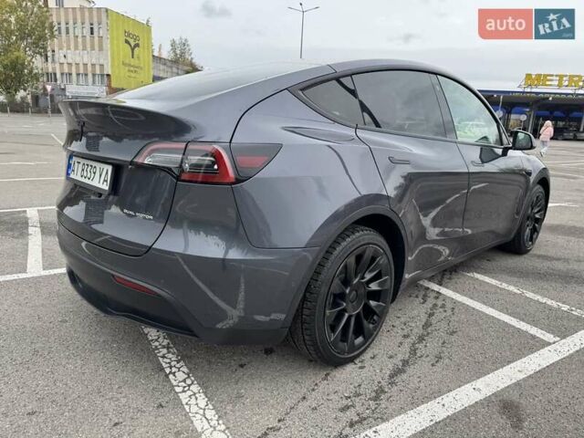 Серый Тесла Model Y, объемом двигателя 0 л и пробегом 61 тыс. км за 25500 $, фото 36 на Automoto.ua