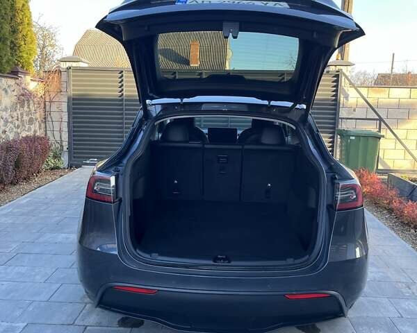 Серый Тесла Model Y, объемом двигателя 0 л и пробегом 23 тыс. км за 29900 $, фото 2 на Automoto.ua