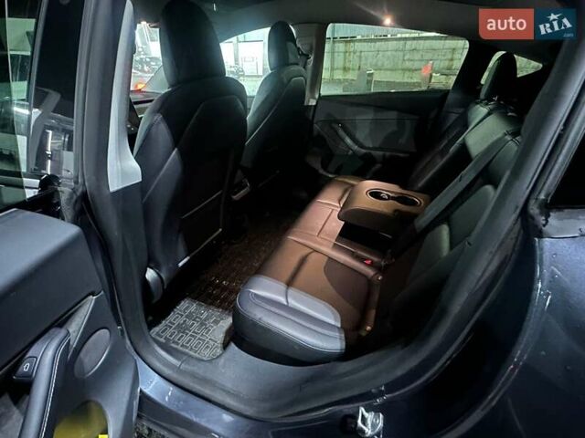 Серый Тесла Model Y, объемом двигателя 0 л и пробегом 64 тыс. км за 28999 $, фото 2 на Automoto.ua