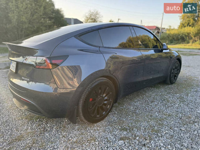 Серый Тесла Model Y, объемом двигателя 0 л и пробегом 112 тыс. км за 27700 $, фото 11 на Automoto.ua