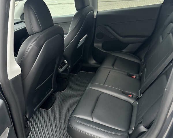 Серый Тесла Model Y, объемом двигателя 0 л и пробегом 58 тыс. км за 28500 $, фото 31 на Automoto.ua