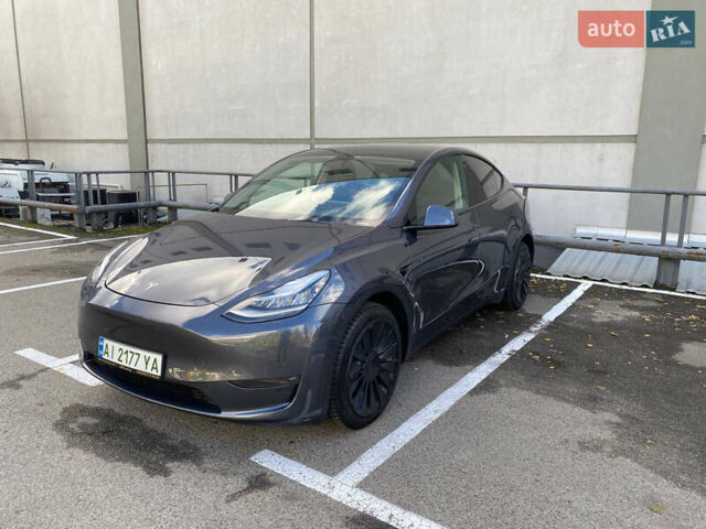 Серый Тесла Model Y, объемом двигателя 0 л и пробегом 57 тыс. км за 43000 $, фото 3 на Automoto.ua