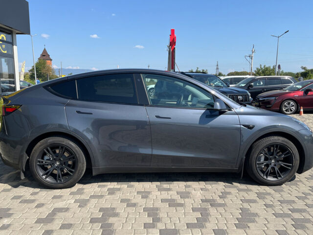Серый Тесла Model Y, объемом двигателя 82 л и пробегом 22 тыс. км за 27000 $, фото 4 на Automoto.ua